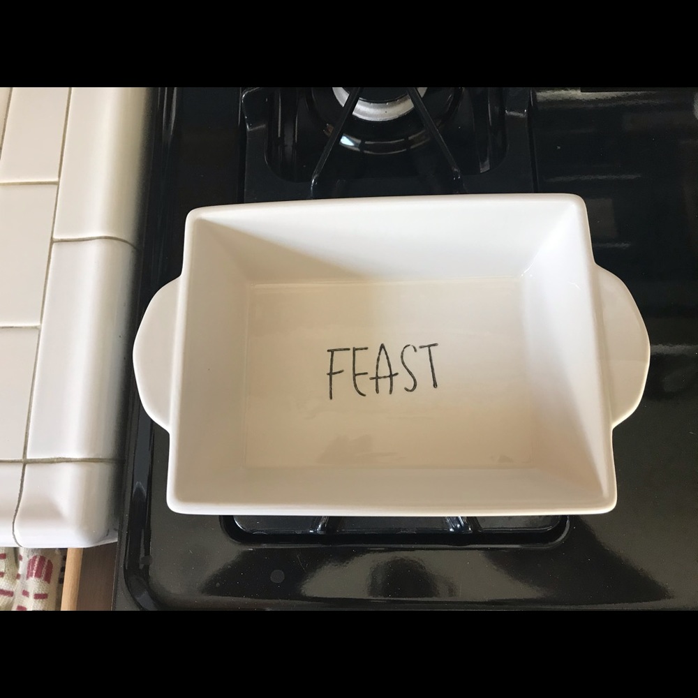 White ceramic loaf pan with the words FIEST inside
